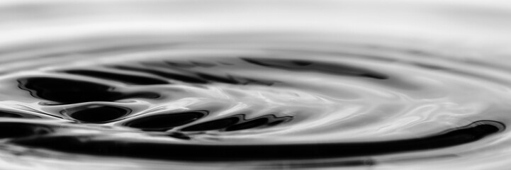 Poster - Water droplet splash background texture isolated on white. Fresh clean pure water ripples and splashes.