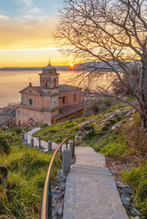 Wall Mural - Trevignano Romano (Italy) - A nice medieval town on Bracciano lake, province of Rome, Lazio region, here at sunset