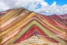 Unidentified  Tourists Walking On The Rainbow Mountain, Peru.