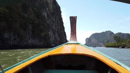 Wall Mural - Head of wooden long tailed boat tour around Thailand Islands