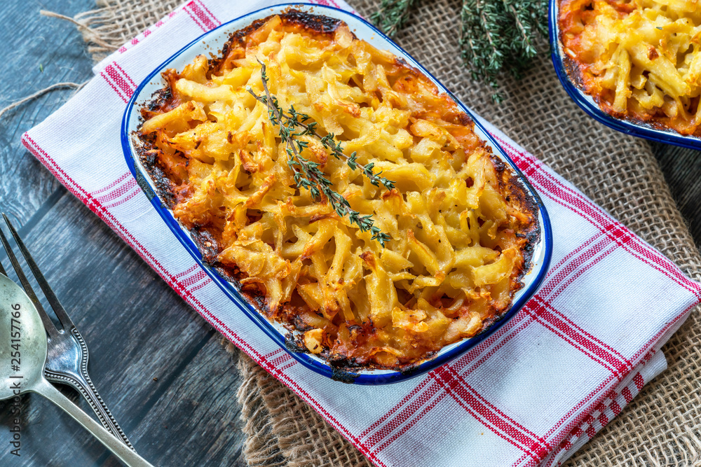 Swiss style potato rosti and pork bake Stock Photo | Adobe Stock