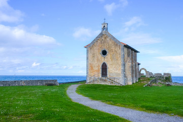 Wall Mural - Landscape of the church of Mundaka, Basque Country. Spain