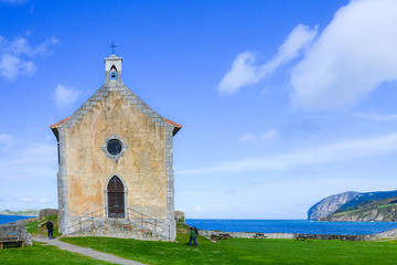 Wall Mural - Landscape of the church of Mundaka, Basque Country. Spain