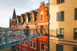 © EVERST - Hugging couple in love traveling together in Stockholm romantic vacations urban lifestyle architecture colorful houses european Sweden landmarks