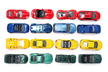 Toy Cars In Neat Rows Of The Four Primary Colours