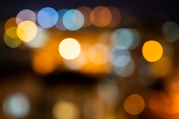 Wall Mural - Colorful defocused bokeh lights in blur night background