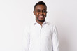 © Ranta Images - Portrait of happy young African businessman smiling