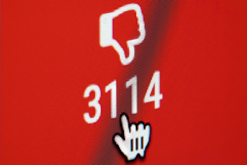Poster - Computer screen with dislike button being clicked.