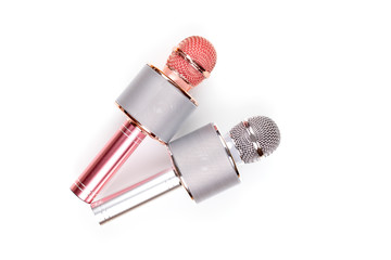 Two microphones isolated over white background . Two wireless microphones for karaoke or entertainment. - Image