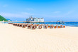 Wicker beach chairs and famous Sellin Seebruecke (Sellin Pier) in summer, Ostseebad Sellin tourist resort, Baltic Sea, Germany