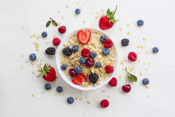 Wall Mural - Oatmeal porridge with berries