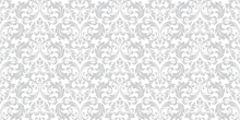 Floral Pattern. Vintage Wallpaper In The Baroque Style. Seamless Vector Background. White And Grey Ornament For Fabric, Wallpaper, Packaging. Ornate Damask Flower Ornament.