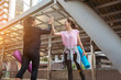 © aFotostock - Sport Fitness Women running exercise in modern city wear wellness sportswear outside. Young woman workout outdoor exercising on bright sunny outside. Healthy wellness lifestyle woman concept.