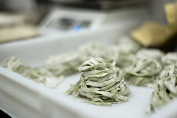 Set of pasta nests on tray