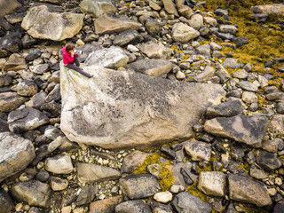 Canvas Print - Tourist with camera on Skagsanden Beach Lofoten Norway