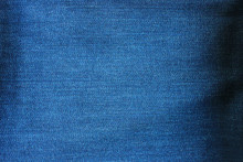 Denim Blue Jeans Texture Background Of Empty Dark Jean Fabric. Close Up Top View Banner And Blank Backdrop Of Empty Denim Canvas Design. Modern Fashion Template Of Blue Colored Jean 