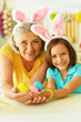 © aletia2011 - Senior grandmother and granddaughter with  Easter eggs