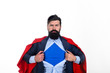 © Svitlana - Superman in red cape showing blue shirt. Save the world. Superhero. Red Superman Cape. Safety hero. Symbol s. Business growth. Super power. Career growth.