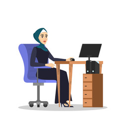 Poster - muslim woman in hijab working at the desk s