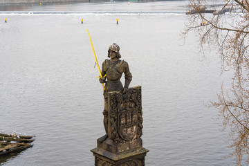 Prague, Czech Republic. The statue of Bruncvik with his famous sword is an outdoor sculpture, installed on the south side of the Charles Bridge. Bruncvik is one of legendary symbols of Czech Republic 