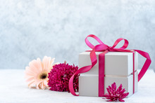 Gift Box With Ribbon And Flowers