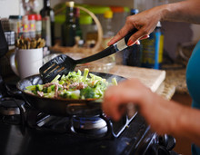 Cooking Beef And Broccoli Stir-fry In Hot Pain Inside Home Kitchen