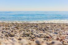 Mediterranean Landscape In Antalya, Turkey. Blue Sea, Waves And Pebble Sandy Beach