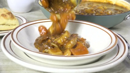 Canvas Print - Serving fresh cooked homemade stew