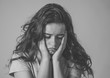 © SB Arts Media - Close up portrait of teenager female suffering depression. Sad face, unhappiness human emotion.