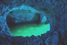 The Rosh HaNikra Natural Grottoes. Tunnel In The Rock. Blue Light