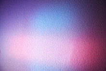 Blurred Textural Background Of Blue Color With A Soft Pink Glow