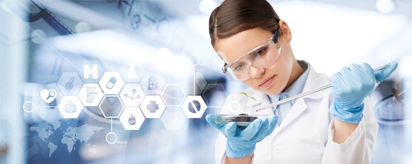 Wall Mural - Young female scientist standing  on background