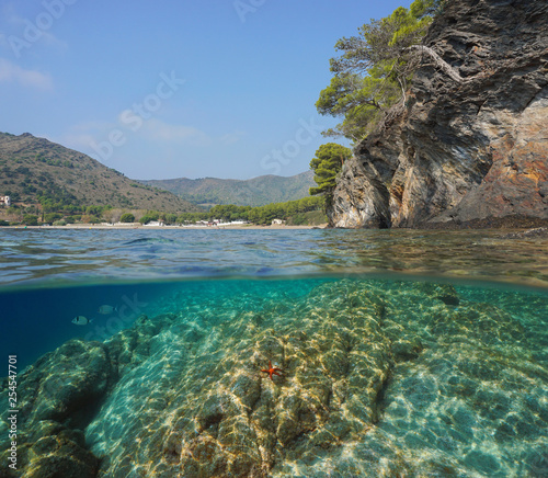 Spain Rocky Coast Near Cala Montjoi Split View Half Over