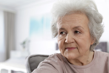 portrait of mature woman in living room