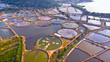 Aerial view of shrimp farm and air purifier in Thailand.
