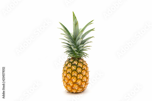 Fotografía Pineapple with green leaves isolated on white background.