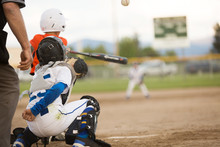 Youth Baseball Game In Action