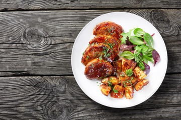 Canvas Print - Oven Baked sticky glazed Pork Chops, copy space