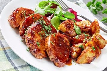 Canvas Print - grilled sticky glazed Pork cutlets on a plate