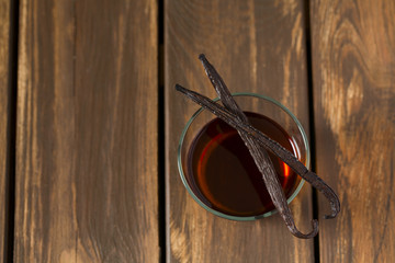 vanilla extract on wooden surface