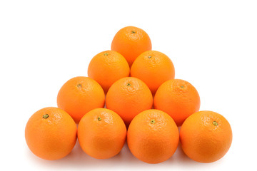 Pyramid of Oranges isolated on white background.