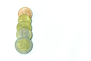 Euro banknotes and coins in a white background. Money. Economy in Europe