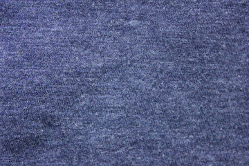 Wall Mural - Pale navy blue texture background of soft cotton shirt fabric surface. Empty cloth material and plain design, flat lay top view of blue hoddie worn pattern