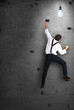 © Zarya Maxim - Businessman climbs the wall as a climber, business concept
