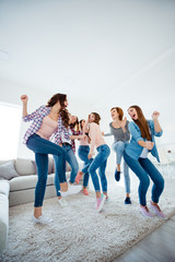 Poster - Vertical full length body size view of nice-looking lovely cool charming attractive cheerful glad crazy optimistic girls wearing casual clothes having fun in light white interior room house indoors