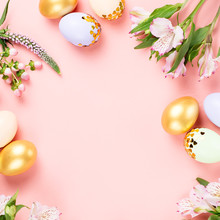 Festive Happy Easter Background With Decorated Eggs, Flowers, Candy And Ribbons In Pastel Colors On Pink. Copy Space
