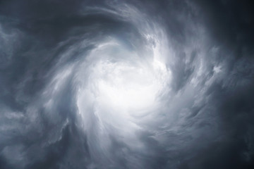 Wall Mural - dark, grim, stormy, rainy sky with rays of light. scary hurricane clouds. natural element. stock pho