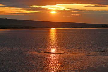 Wall Mural - Fleet Basin and Chesil Bank at sunset