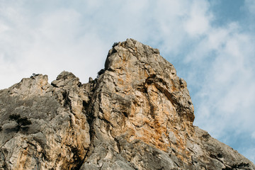 Peak of mountain range at sky background. Hiking, travel and summer tourism concept with copy space