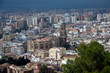 Malaga, Spain, February 2019. Panorama of the Spanish city of Malaga. Buildings against a cloudy sky. Dramatic sky over the city. Beautiful view.